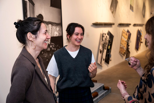 The opening reception of the School of Art MFA Class of 2025 thesis exhibition, "Holding Still, Holding On"  in March 2025 at The Warhol.