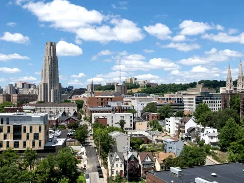Aerial view of Carnegie Mellon University's campus and the surrounding Pittsburgh, PA city neighborhood on a sunny day