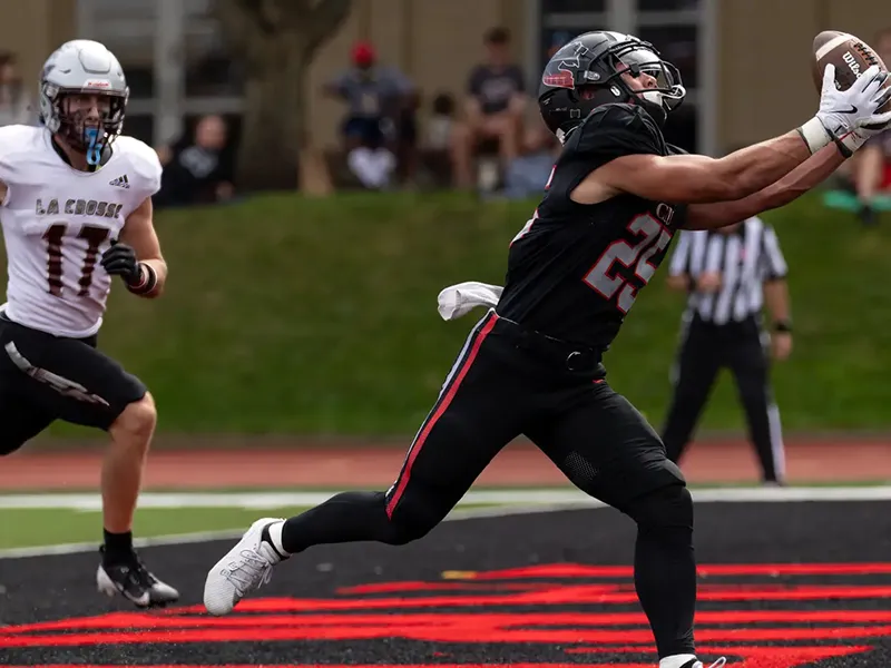 CMU football team playing. 