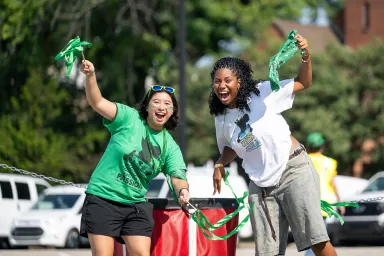Two students smiling on move-in day