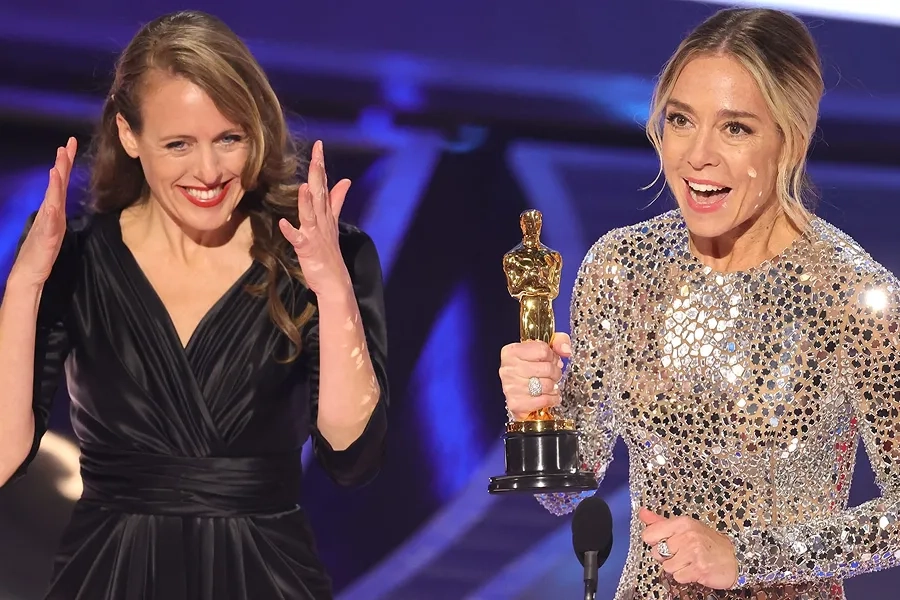 Sian Heder on stage accepting an Oscar award